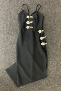 Vestido longo de bandagem preta com tiras de cristal e flor dividida