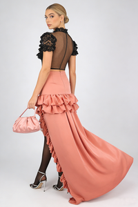 Saia comprida assimétrica com folhos