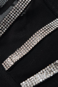 Vestido de bandagem com fenda alta de cristal oco de malha preta com decote em O