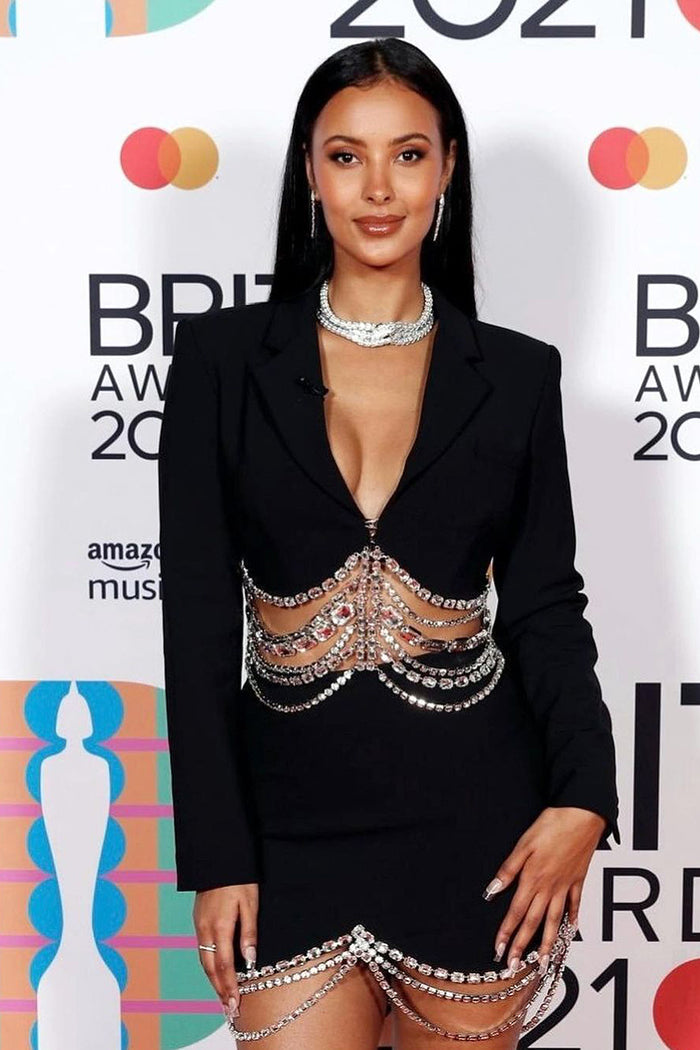 Traje de dos piezas con borlas de diamantes de imitación y cuello en V blanco y negro