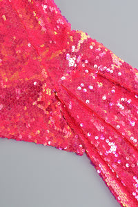 Conjunto de dos piezas con falda y top rosa con lentejuelas