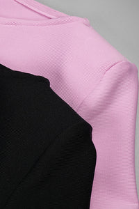 Vestido midi ajustado con cuello redondo y manga larga en color rosa, negro y blanco