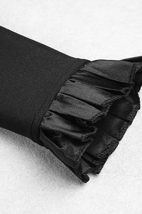 Vestido mini bandagem preto com decote em V manga comprida com babados e botão